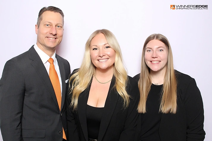 Brian Schmitz smiling With his Team