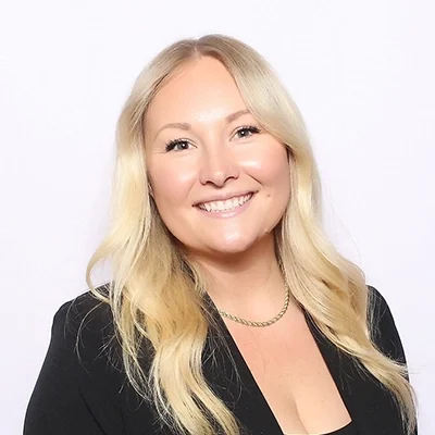 Kaylee smiling in a black shirt.